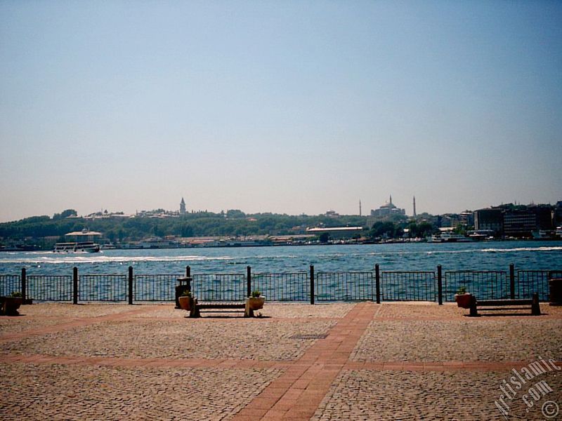 View of Eminonu coast, Ayasofya Mosque (Hagia Sophia) and Topkapi Palace from the shore of Karakoy in Istanbul city of Turkey.
